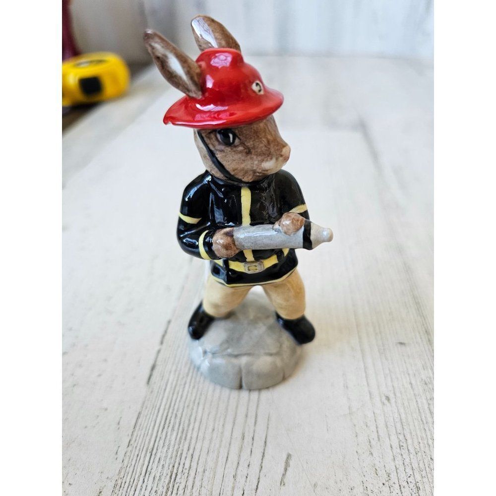 Royal Doulton American firefighter DB 268 figurine vintage as is 2002